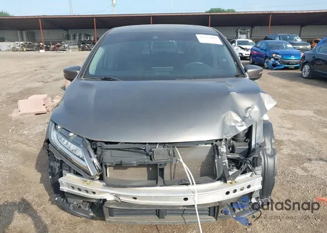 2019 Honda Odyssey Touring z USA, uszkodzony, nr VIN 5FNRL6H83KB103283